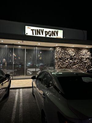 Tiny Pony Tavern spills into a large backyard