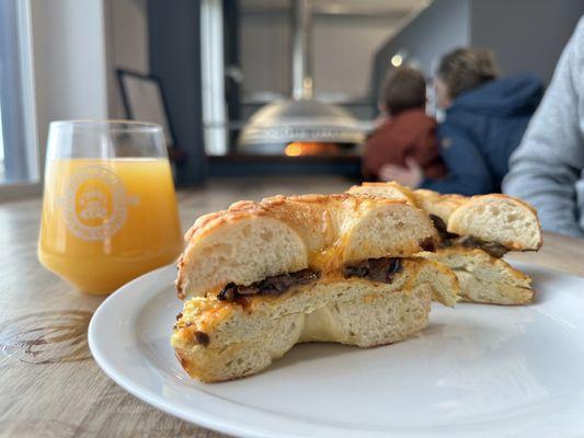 Mushroom, egg, cheese on an Asiago bagel