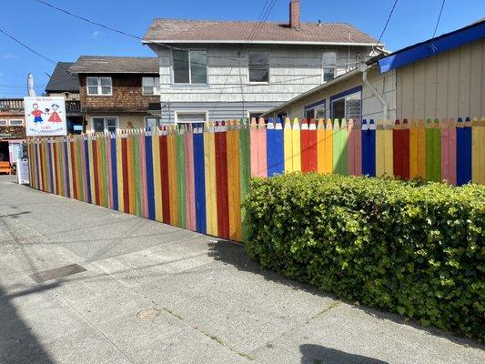 Seattle ELC's colorful pencil fence around the preschool.