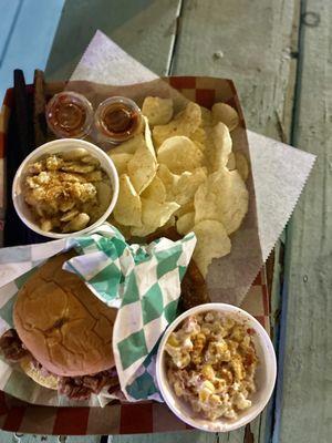 Brisket sandwich with sides - street corn and potato salad