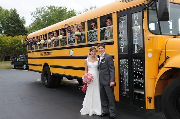 This couple met in middle school, so they rented a school bus to transport their guests.   Photos by Light on Life Images.