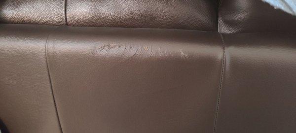 Damaged Leather Sofa because they refused to wrap it.