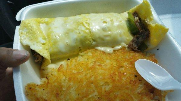 Phillip cheese steak omelette and hash browns