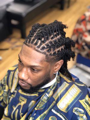 Retwist and style with haircut.