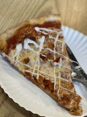 Buffalo pizza drizzled with ranch