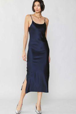 This luxe, mid-length slip dress has that alluring '90s minimalist look down pat. featured sexy little slit