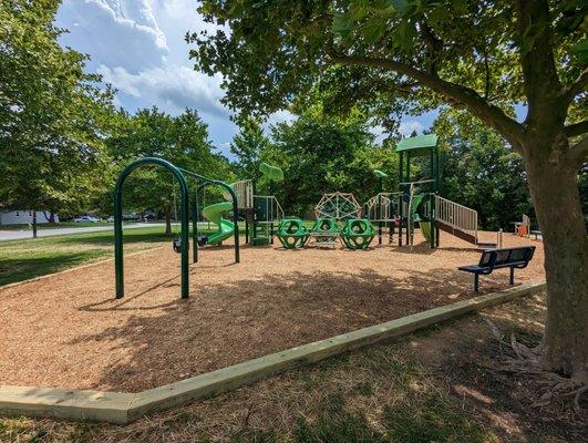 This is one of several views of the replaced playground.  Photo taken June 12, 2023.