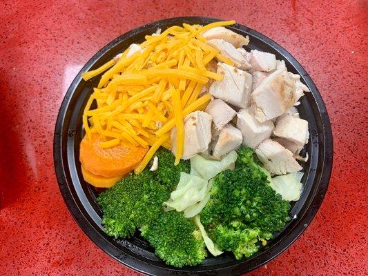 Chicken Veggie bowl 
Steamed veggies, all white meat and cheese.