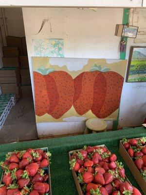 This painting of strawberries brings a lot of joy to the already joyous scenario of being surrounded by strawberries