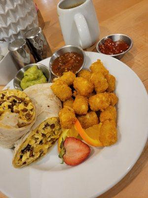 breakfast burrito with choice of meat (sausage, chorizo or bacon)...$17...coffee $3...$21.87 after tax...