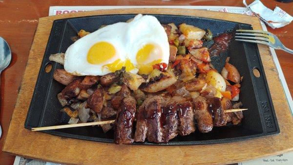 The Skewers Skillet: steak tips, potatoes, onions, peppers, cheese and two eggs.  Delicious!