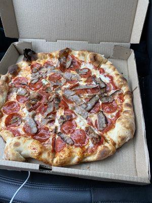 Pepperoni and sausage pizza