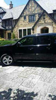 Alabama Sedan waiting to load a family of 5 for a trip to the airport