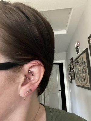 daith piercing and third piercing done by Captive Heart Tattoo!