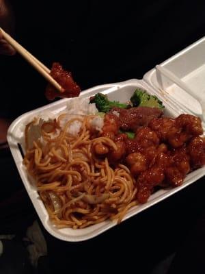 Beef and broccoli, steamed white rice, chow mein, and orange chicken