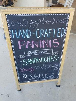 The Sandwich board in the front of the location