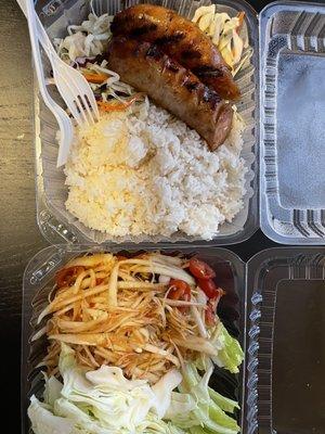 Lao sausage with steamed rice ( they don't have sticky rice )   Lao style papaya Salad