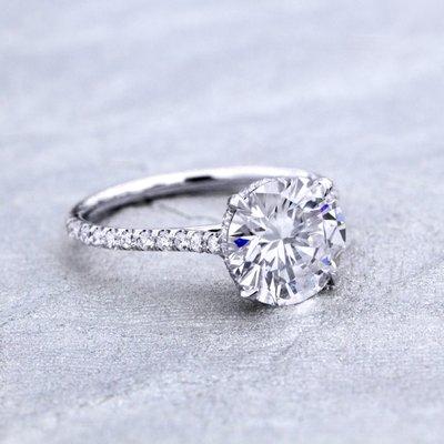 One of our best sellers shown in white gold with a gorgeous brilliant cut round diamond.