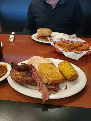 Brisket, bbq chicken, smoked turkey, all of which were very dry, baked beans which were gross