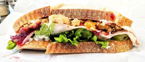 The Gobbler- turkey, cran, stuffing, lettuce, mayo, + black pepper on rye. Yummy! Talk turkey to me!