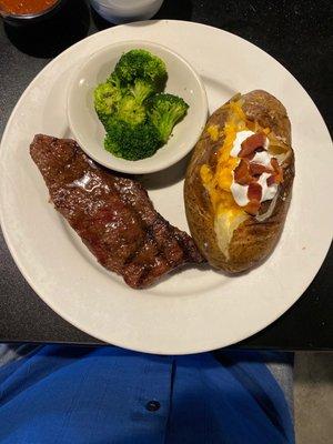 Sirloin steak, broccoli and baked potato.