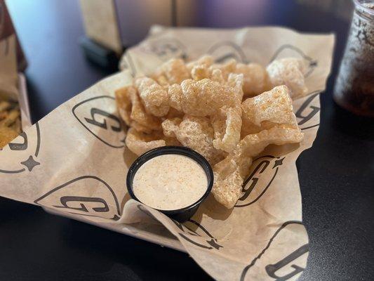 Pork rind appetizer with horseradish. So fresh they were still crackling.