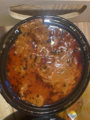 Butter chicken swimming in oil!