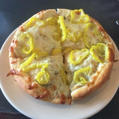 White pizza with banana peppers