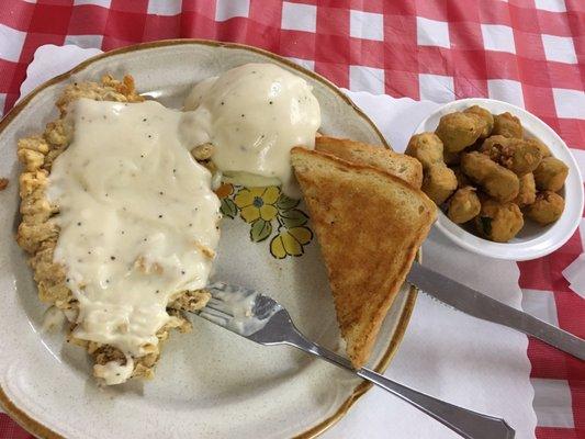 Chicken fried steak with mashed potatoes and okra