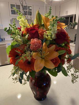 Beautiful seasonal arrangement with nice vase! Delivered next day!