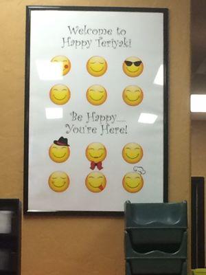 Cool "happy" poster on wall.