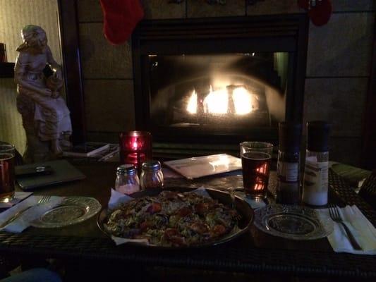 Everything pizza, beer, and a warm fire.