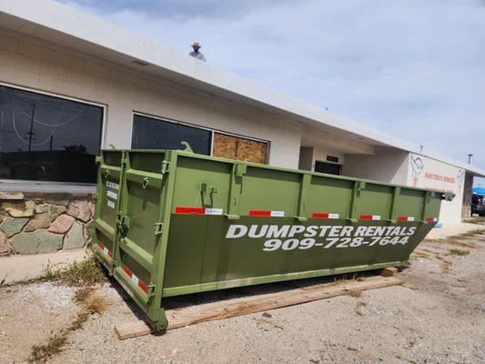 A local roofing company using our 20 yard roll off dumpsters to haul their debris