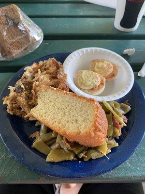 Chicken and stuffing with green beans and deviled eggs and cornbread.