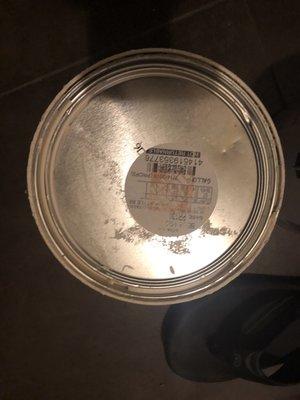 Top of lid that show it I'd indented and date purchased