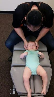 This little adorable 6 month old boy got his #PowersOn today for his first chiropractic adjustment!