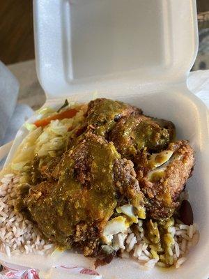 Fries chicken with rice and peas and curry gravy