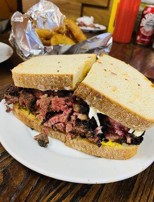 Pastrami on rye with deli mustard and coleslaw