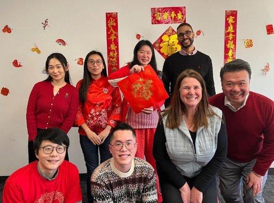 Arbella employees celebrating Lunar New Year.