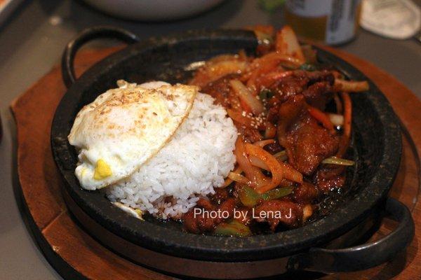 Spicy Pork Sura Hot Stone Plate Bibimbap ($21.95) - rice served on a stone plate mixed with seasoned spicy pork, assorted vegetables