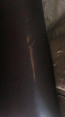 Damaged leather couch