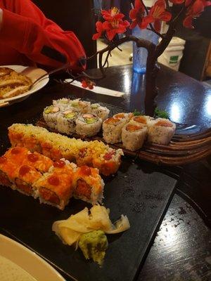 Volcano roll, California roll, Christmas roll and spicy salmon roll