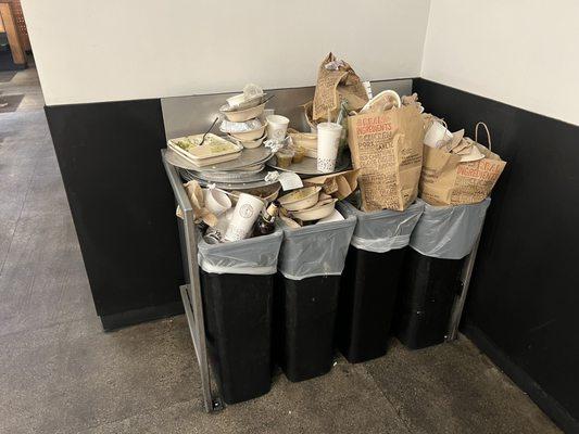 Gross cans. I doubt they sanitize those serving trays based on how they keep their restaurant.