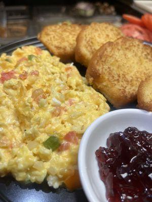 MAGA special huevos perico with cheese and grilled corn muffin