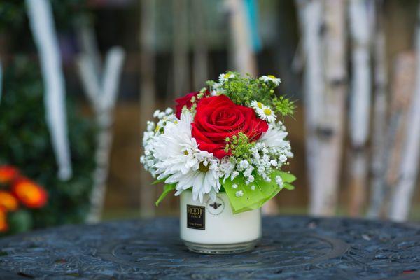 Great Mother's day gift. Our Root candle with fresh flowers top. $39.95