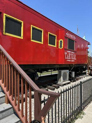 Tomball and Walden railway caboose from the outside