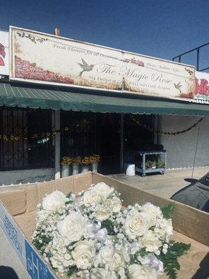 Storefront and girls wrist corsages