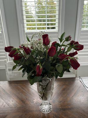 Two Dozen red roses less than 24 hours of receiving them.