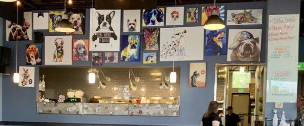 The doggie (art) wall, with a view into the kitchen.