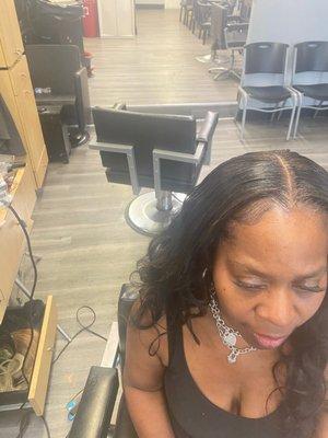 Middle part sew in hair left in natural state